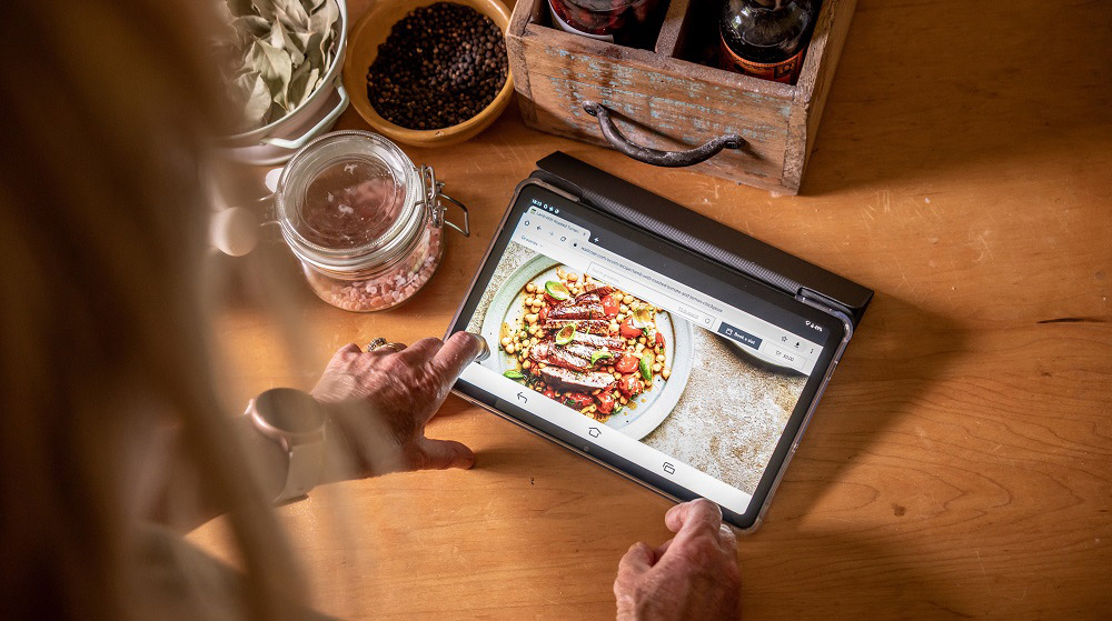Doro tablet showing recipe app with food inspiration on kitchen table