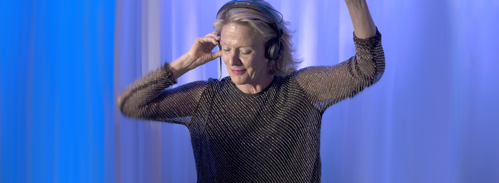 Dancing woman with headphones. 