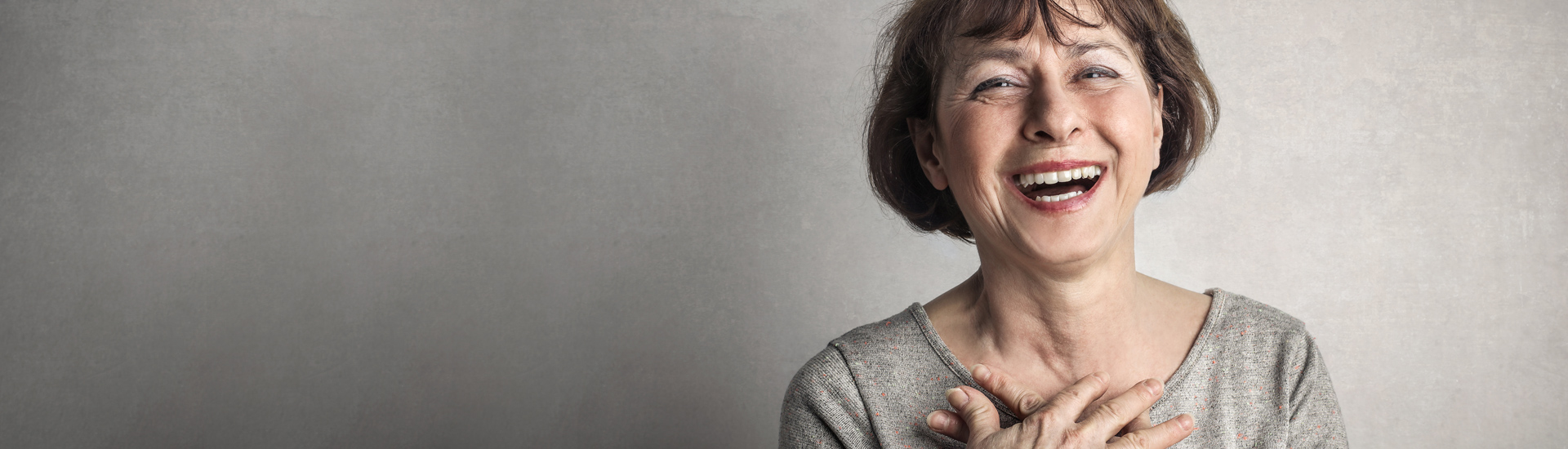 Woman laughing.