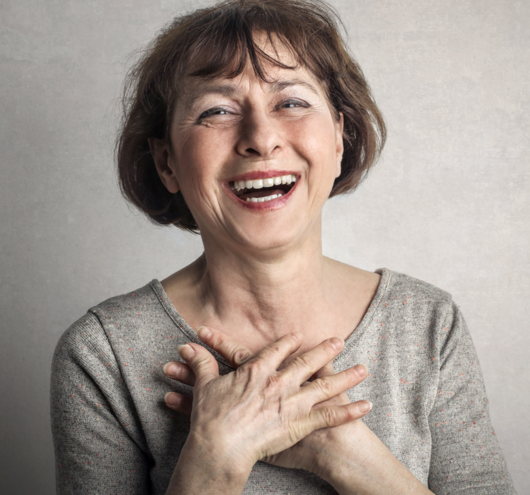 Woman laughing.